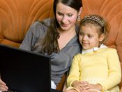 An image of the woman and her daughter browsing online